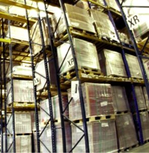 Regional Freight Distribution Warehouse - I.J.McGill Transport Warehouse with stacked pallets for regional freight distribution.